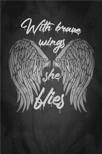 With Brave Wings She Flies