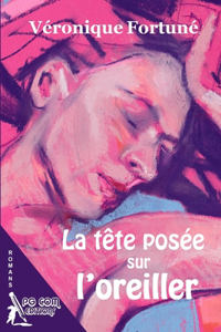 La tête posée sur l'oreiller
