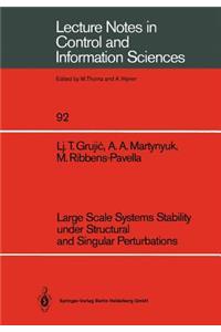 Large Scale Systems Stability Under Structural and Singular Perturbations