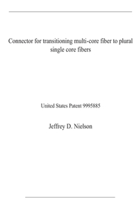 Connector for transitioning multi-core fiber to plural single core fibers