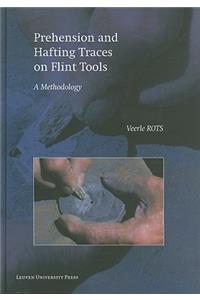 Prehension and Hafting Traces on Flint Tools