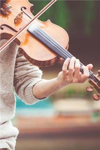 Playing a Beautiful Violin Musical Instrument