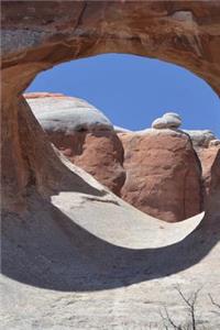 A View Through Tunnel Arch in Arches National Park Utah USA Journal