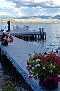 A Tranquil Pier with Flowers on Lake Okanagan Canada Journal