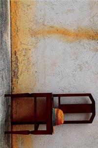 Chair and a Hat on a Wall in Havana, Cuba Journal