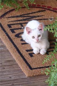 White Kitten Sitting on a Welcome Mat Journal