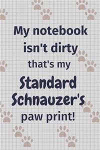 My notebook isn't dirty that's my Standard Schnauzer's paw print!