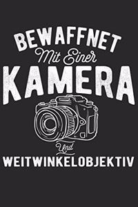 Bewaffnet Mit Einer Kamera Und Weitwinkelobjektiv