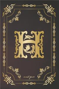 H antique: A gorgeous royal vintage monogram journal with cream blank pages and beautiful antique design.