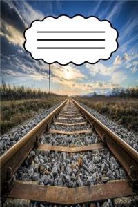 Notizbuch mit Eisenbahnschienen
