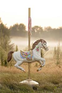 A Pretty Painted Wooden Carousel Horse in a Field Fantasy Journal