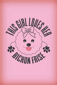 This girl loves her Bishon Frise
