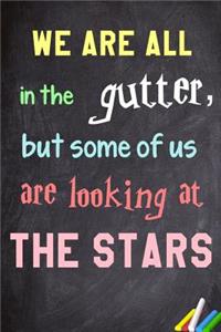 We are all in the gutter, but some of us are looking at the stars