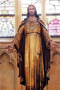 Inspiring Statue of Jesus Christ Son of God in a Church Journal