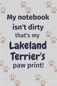 My notebook isn't dirty that's my Lakeland Terrier's paw print!