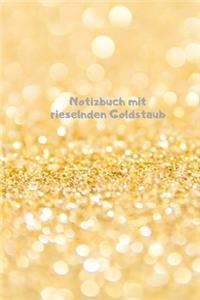 Notizbuch mit rieselnden Goldstaub