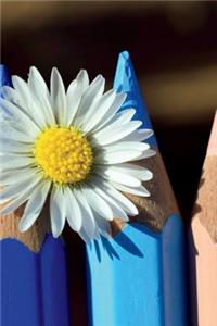 Colored Pencils and a Daisy Flower Journal