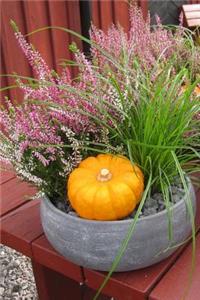 Autumn Table Arrangement with a Pumpkin, Heather and Grasses Journal