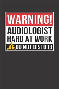 Warning Audiologist Hard At Work