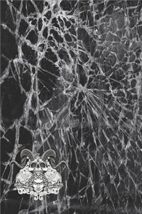 Broken glass Notebook with skulls and head