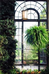 Green Plants in a Decorative Greenhouse with Arched Windows Journal