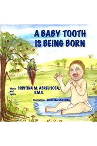 A baby tooth is being born