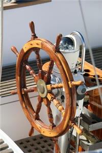 The Helm Journal Steering Wheel on a Yacht/Boat/Ship