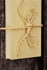 Book Wrapped in a Bow Journal