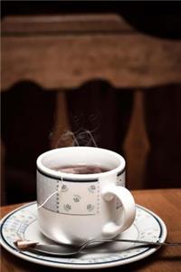 A Cup of Hot Tea in the Early Morning Journal