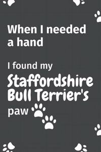 When I needed a hand, I found my Staffordshire Bull Terrier's paw