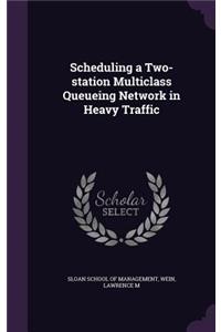 Scheduling a Two-station Multiclass Queueing Network in Heavy Traffic