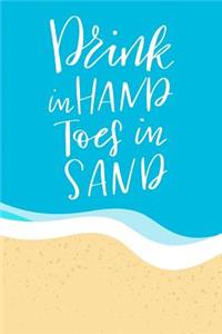 Drink in Hand Toes in Sand