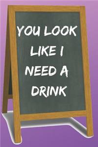 You Look Like I Need a Drink Blank Lined Notebook Journal