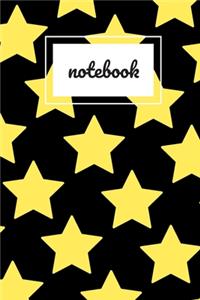 Black and yellow star print notebook