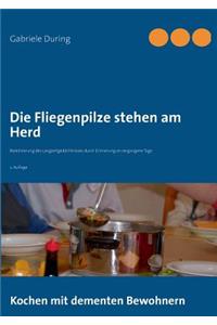 Die Fliegenpilze stehen am Herd