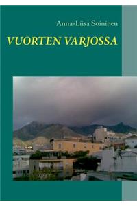 Vuorten varjossa