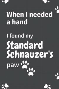 When I needed a hand, I found my Standard Schnauzer's paw