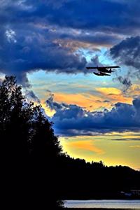Seaplane Silhouetted Against the Morning Clouds Journal