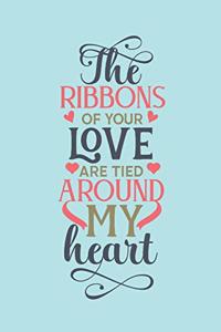 The ribbons of your love are tied around my heart