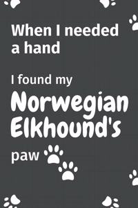 When I needed a hand, I found my Norwegian Elkhound's paw