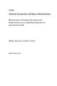 Measurements of Fuselage Skin Strains and Displacements Near a Longitudinal Lap Joint in a Pressurized Aircraft