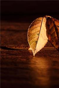 A Leaf of Fall on a Table Journal