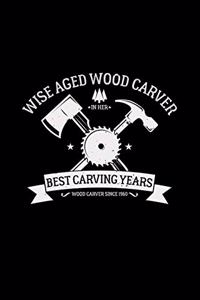 Wise aged wood carver in her best carving years