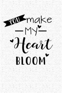 You Make My Heart Bloom: A 6x9 Matte Softcover Notebook Journal with 120 Blank Lined Pages and an Animal Loving Pet Dog Owner Cover Slogan