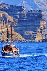 A Boat in the Sea Near the Coast of Santorini Greece Journal