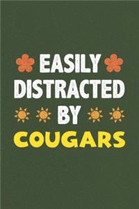Easily Distracted By Cougars