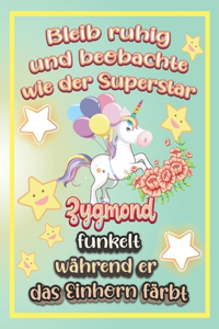 Bleib ruhig und beobachte wie Superstar Zygmond funkelt während sie das Einhorn färbt