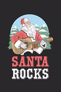 Kerstmis Santa Rocks gitaar muziek