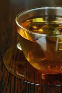 Morning Tea with a Clear Glass Cup and Saucer