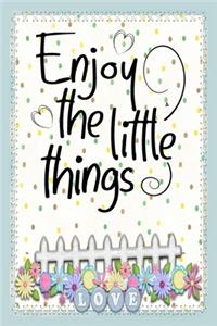 Enjoy the little things motivational quote on cute cover to start a happy new year with joy and fun